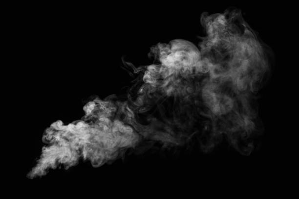 White hot curly steam smoke isolated on black background, close-up. movement of smoke on black background, smoke background, abstract smoke on black background.